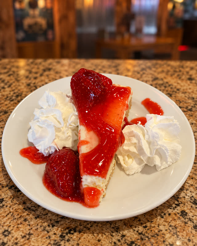 Strawberry cheesecake with whipped cream