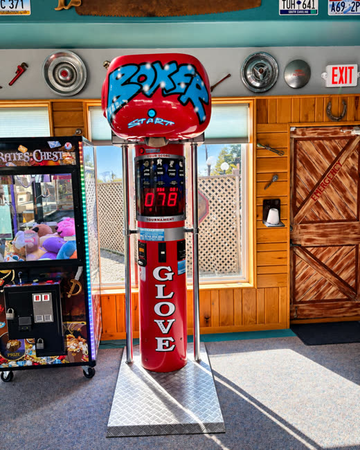 Boxer glove punching machine