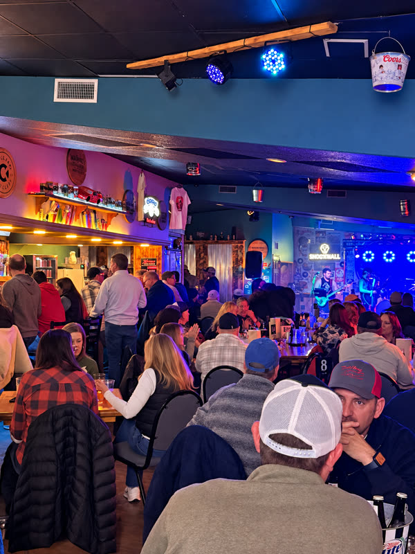 The crowd facing the stage